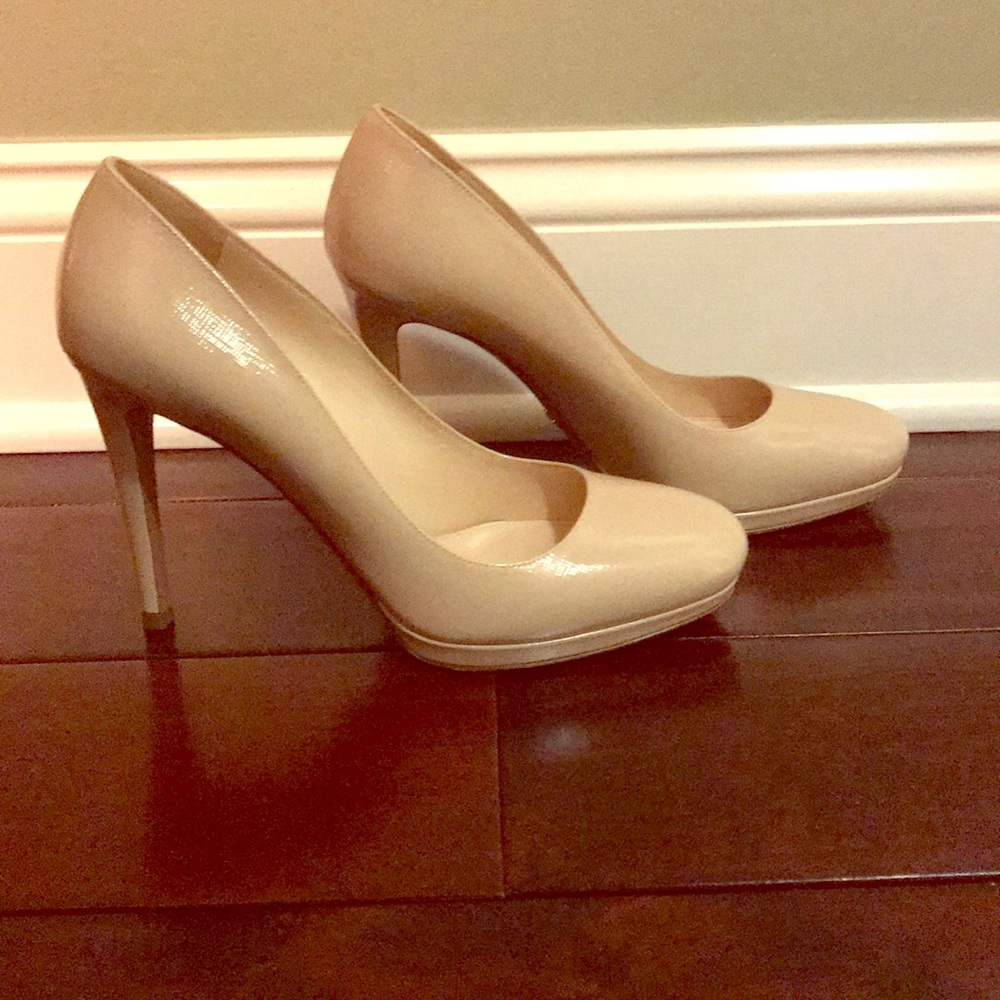 Pair of beige Prada high heeled shoes